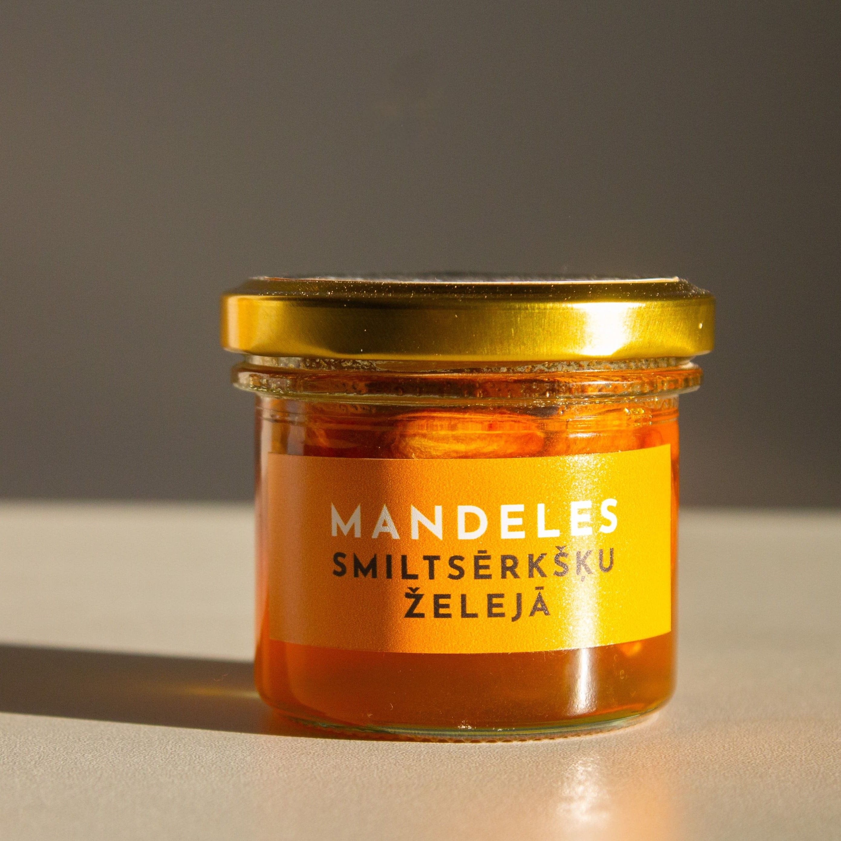 Mandeles smiltsērkšķu želejā, 100 g